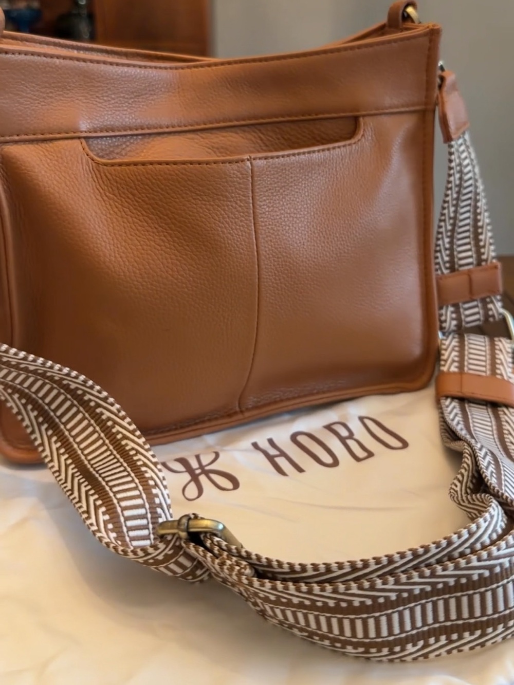 HOBO Cognac Leather Messenger with Patterned Webbing Strap